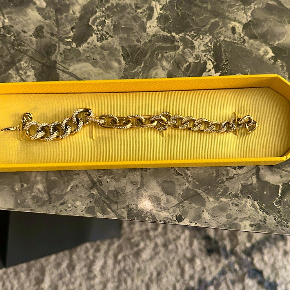EUC SWAROVSKI Crystal -14 karat gold plated  bracelet. Worn a few times, small